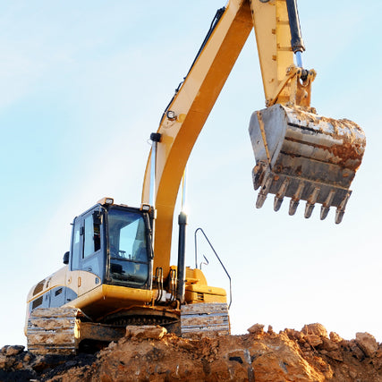 ContractorA loader on a large mound of soil
